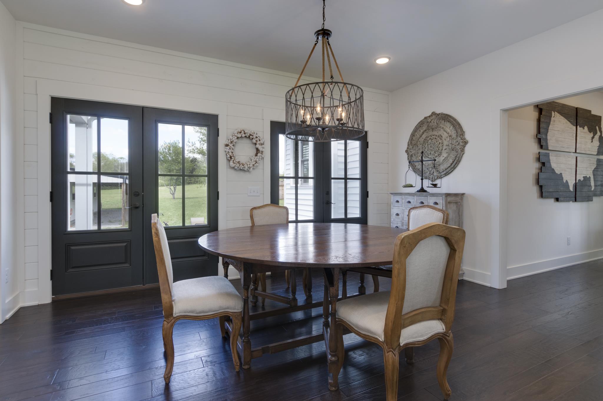 1024 Franklin Road Gallatin, TN 37066 - Photo 8 of 28 a view of a dining room with furniture window and wooden floor