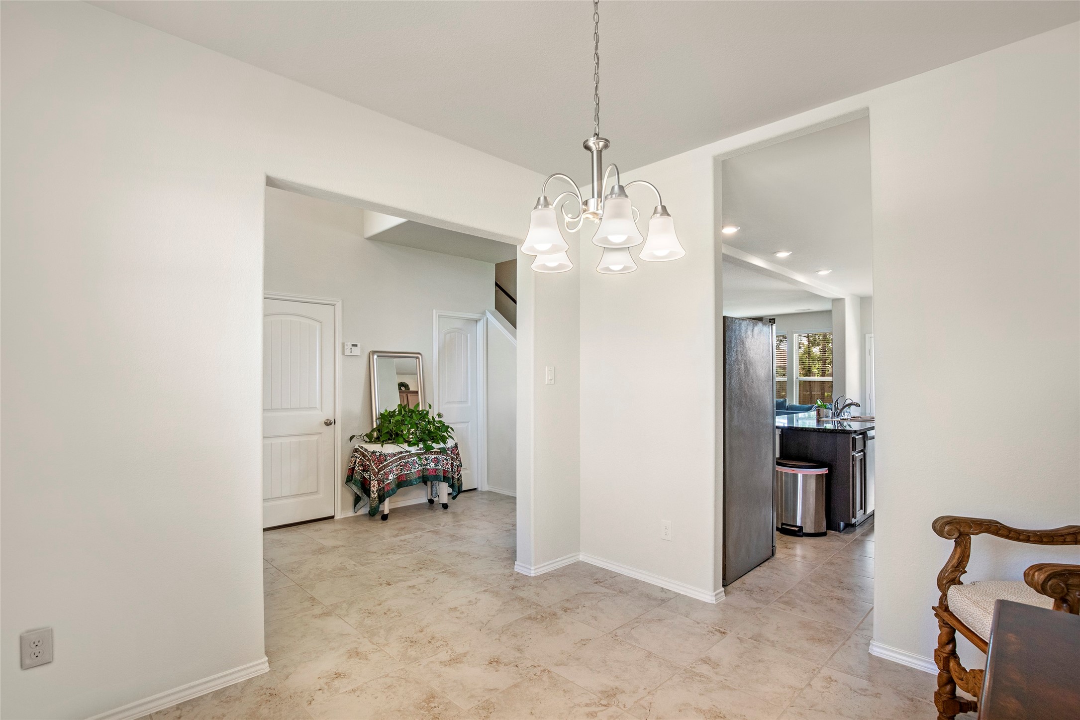 4519 Whitehaven Ridge Way Porter, TX 77365 - Photo 13 of 35 a living room with furniture and chandelier
