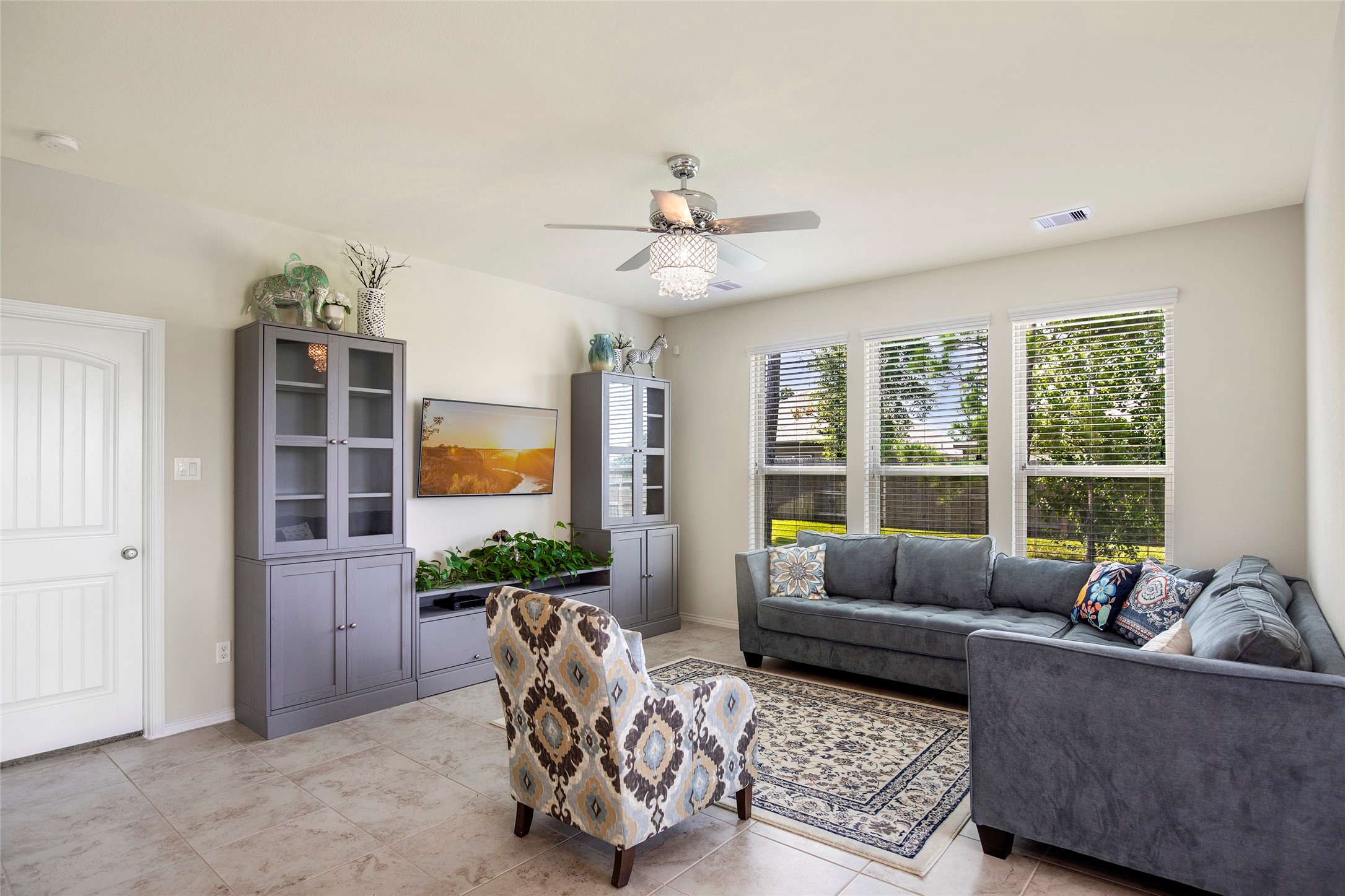 4519 Whitehaven Ridge Way Porter, TX 77365 - Photo 21 of 35 a living room with furniture and a large window