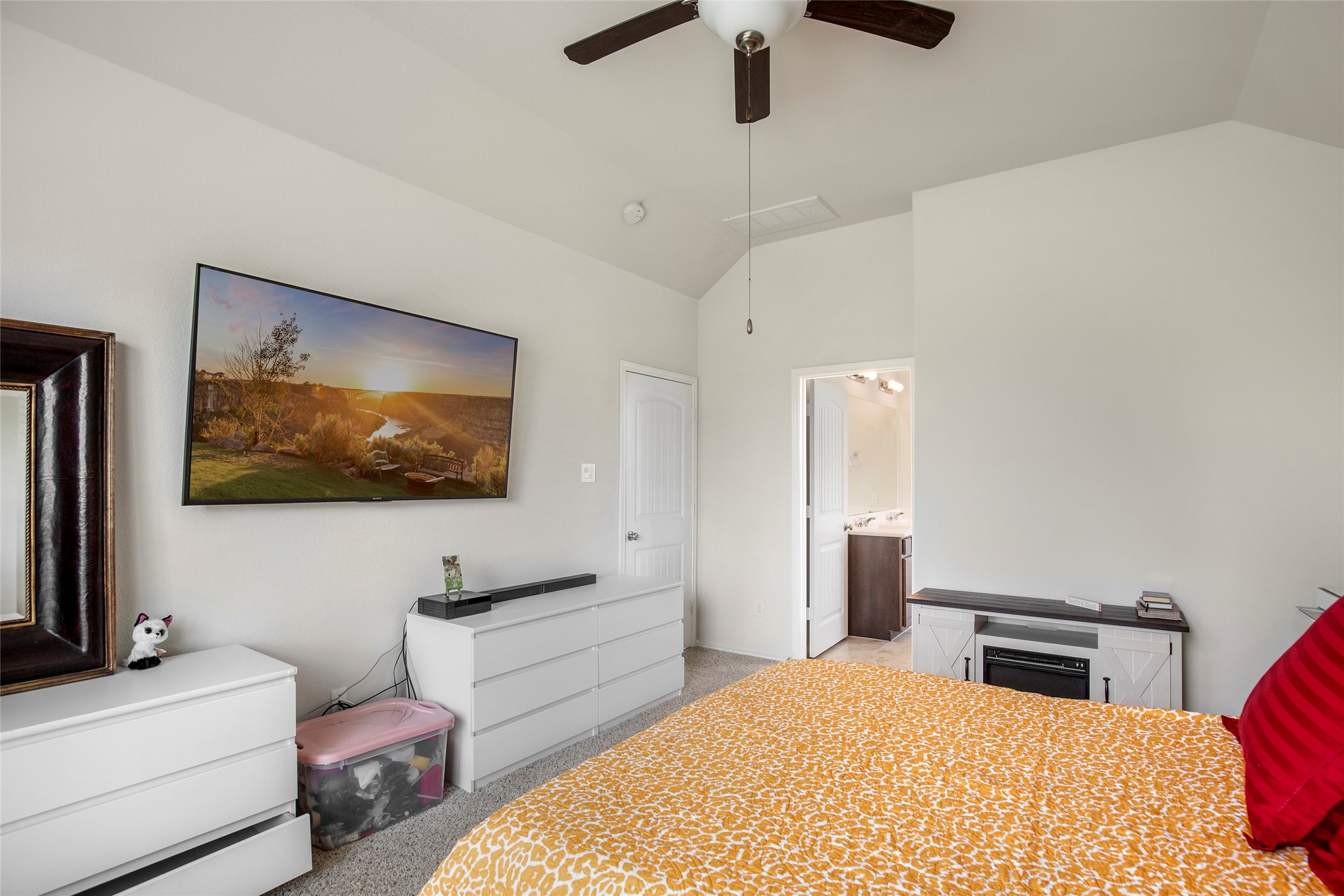 4519 Whitehaven Ridge Way Porter, TX 77365 - Photo 25 of 35 a bedroom with a bed and a flat screen tv