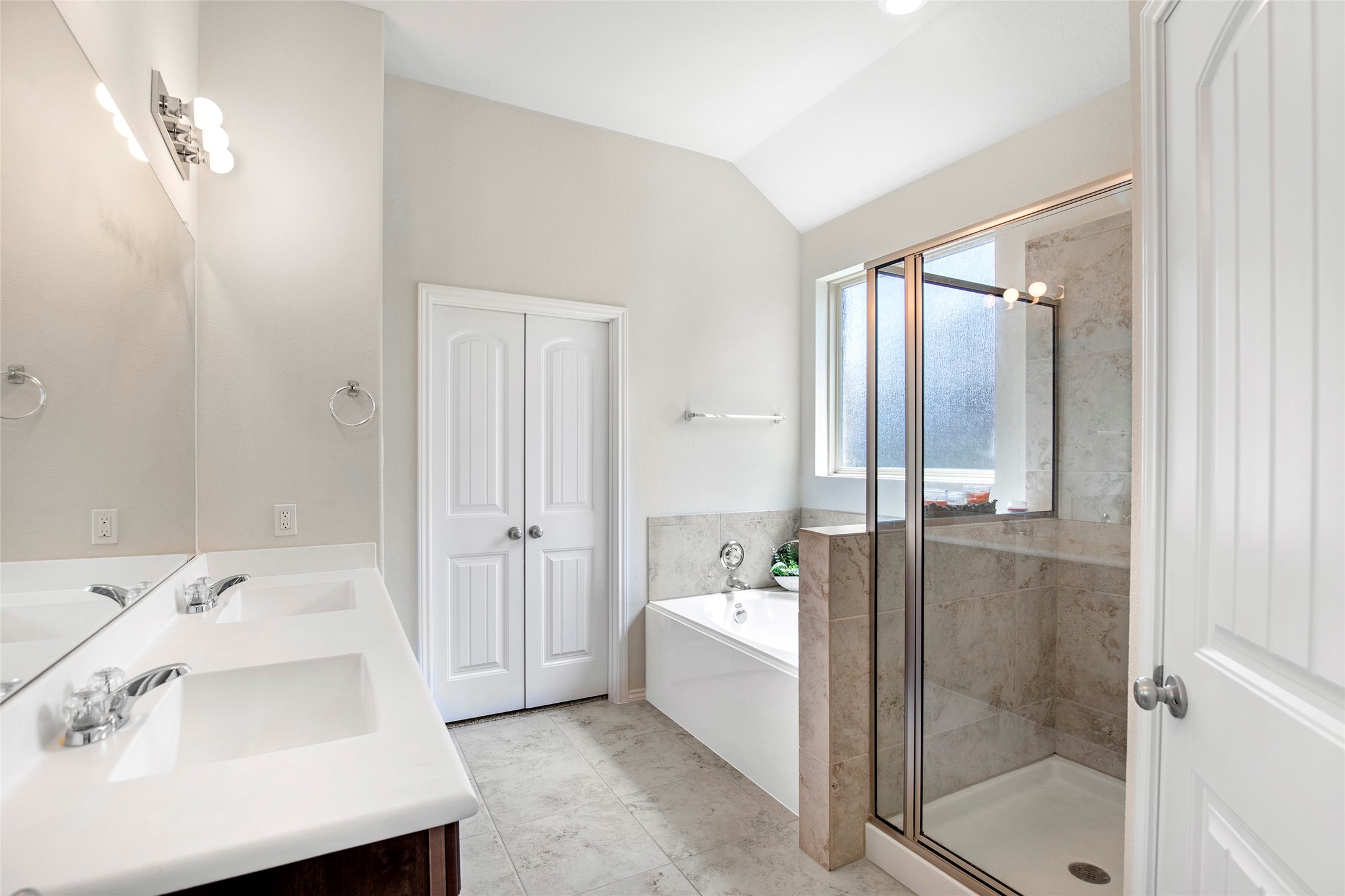 4519 Whitehaven Ridge Way Porter, TX 77365 - Photo 26 of 35 a bathroom with a sink and shower
