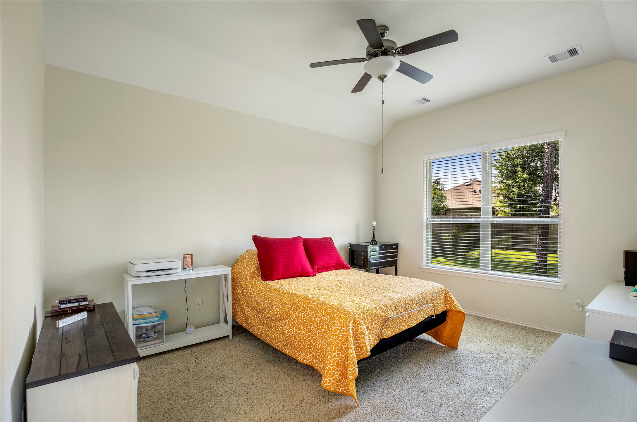 4519 Whitehaven Ridge Way Porter, TX 77365 - Photo 30 of 35 a bedroom with a bed and wooden floor