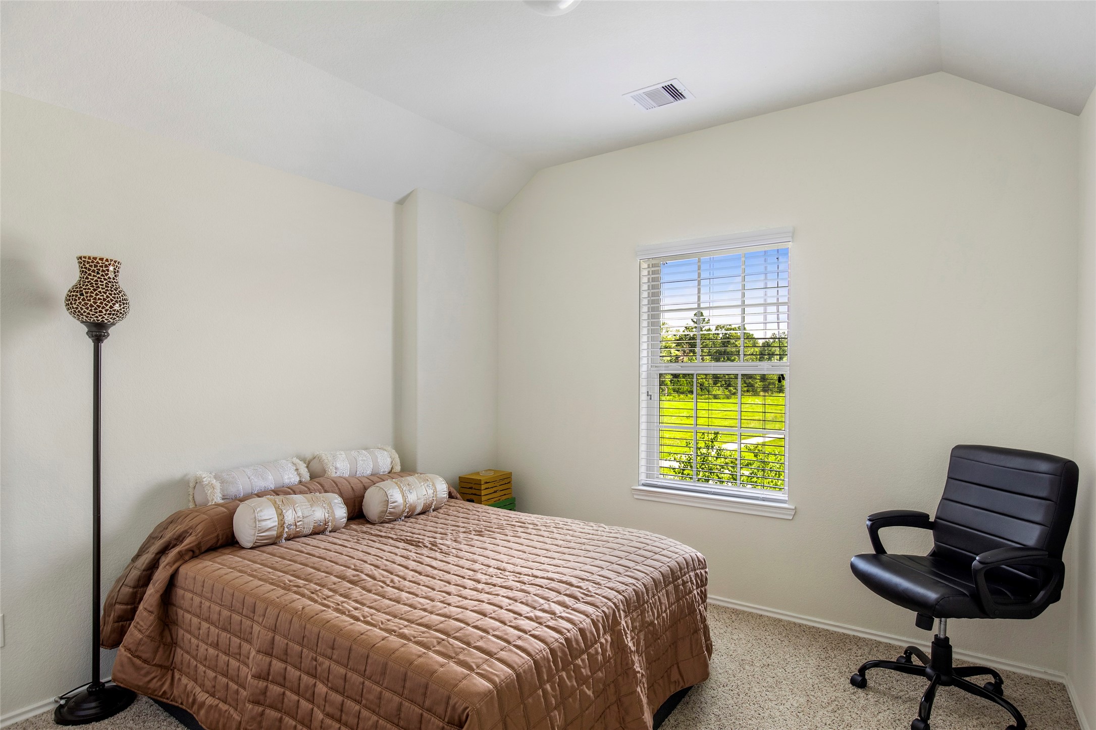 4519 Whitehaven Ridge Way Porter, TX 77365 - Photo 32 of 35 a bedroom with a bed and a window