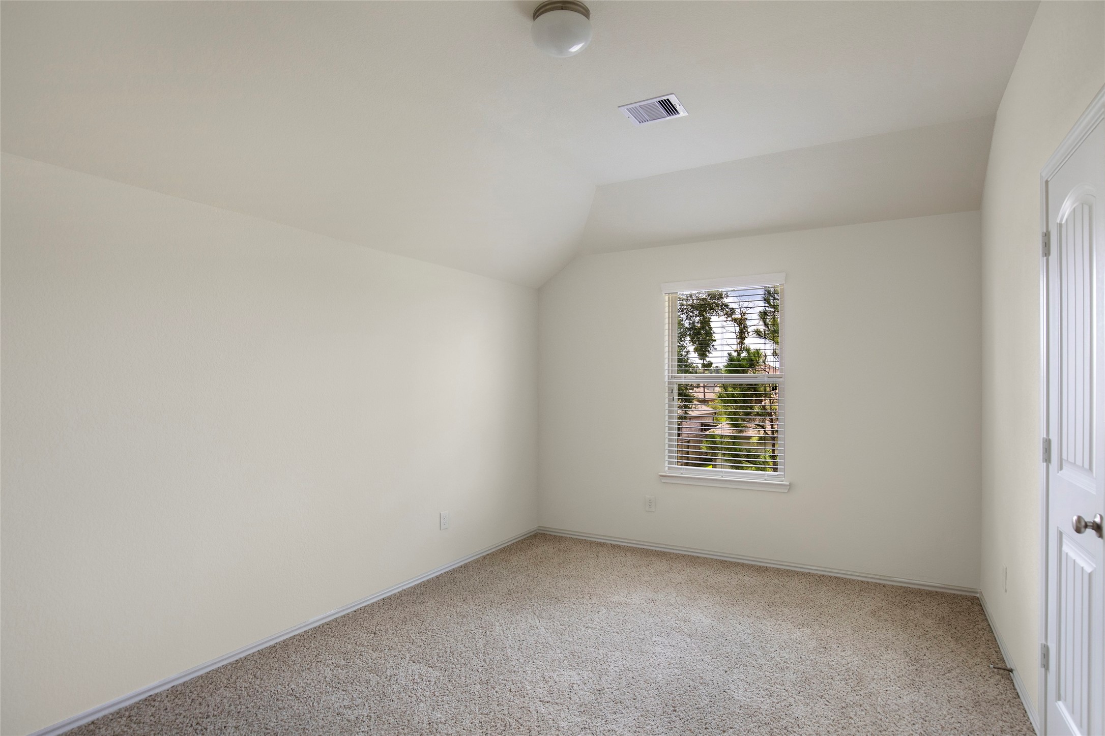 4519 Whitehaven Ridge Way Porter, TX 77365 - Photo 34 of 35 an empty room with windows
