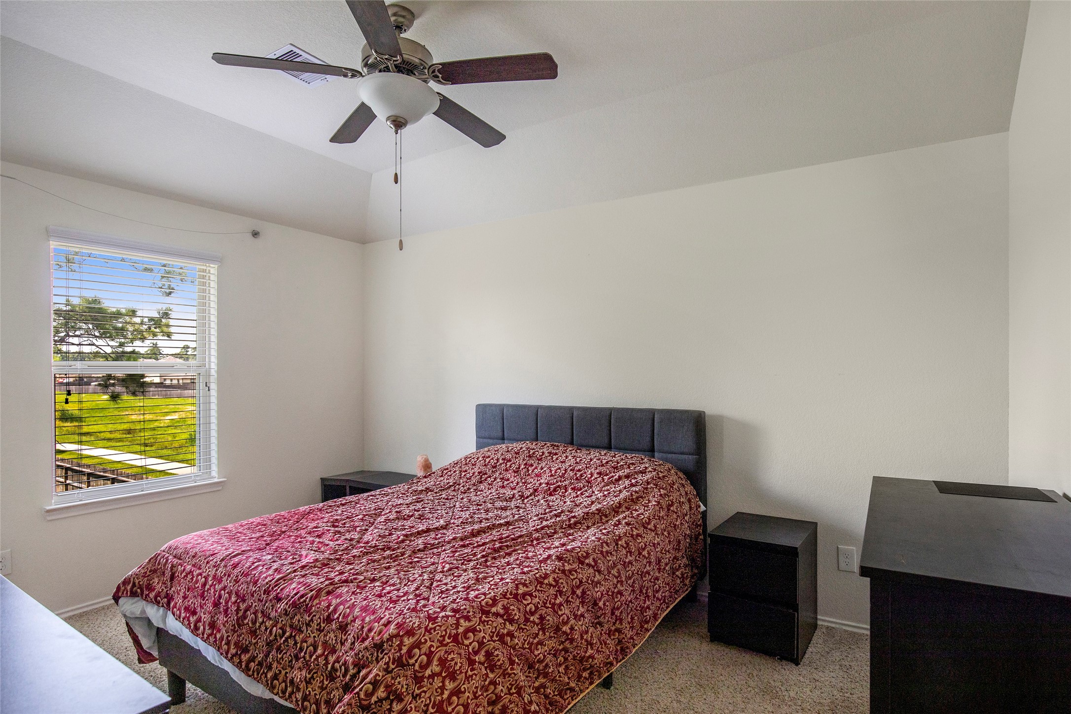 4519 Whitehaven Ridge Way Porter, TX 77365 - Photo 35 of 35 a bedroom with a bed and a window
