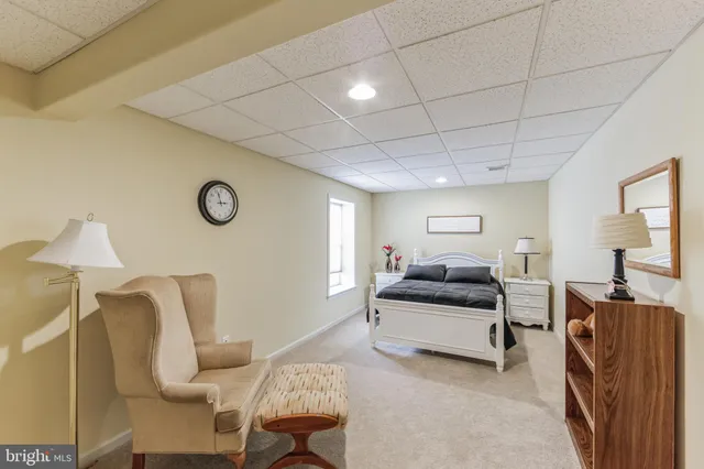 a bedroom with furniture and a couch