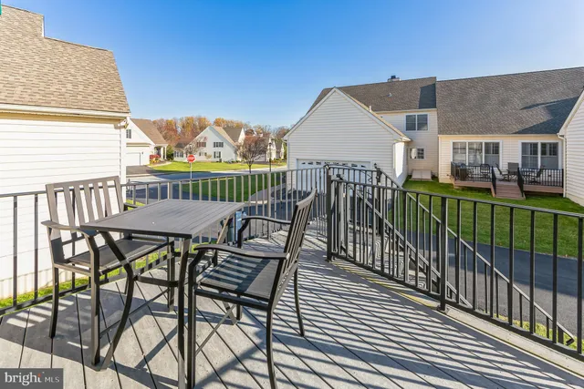 a view of a chairs and table on the terrace