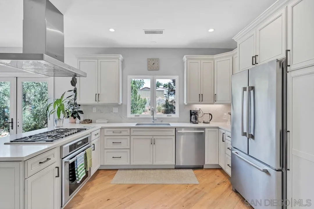 1356 Real Way Lane Alpine, CA 91901 - Photo 13 of 58 a kitchen with a sink stove and refrigerator
