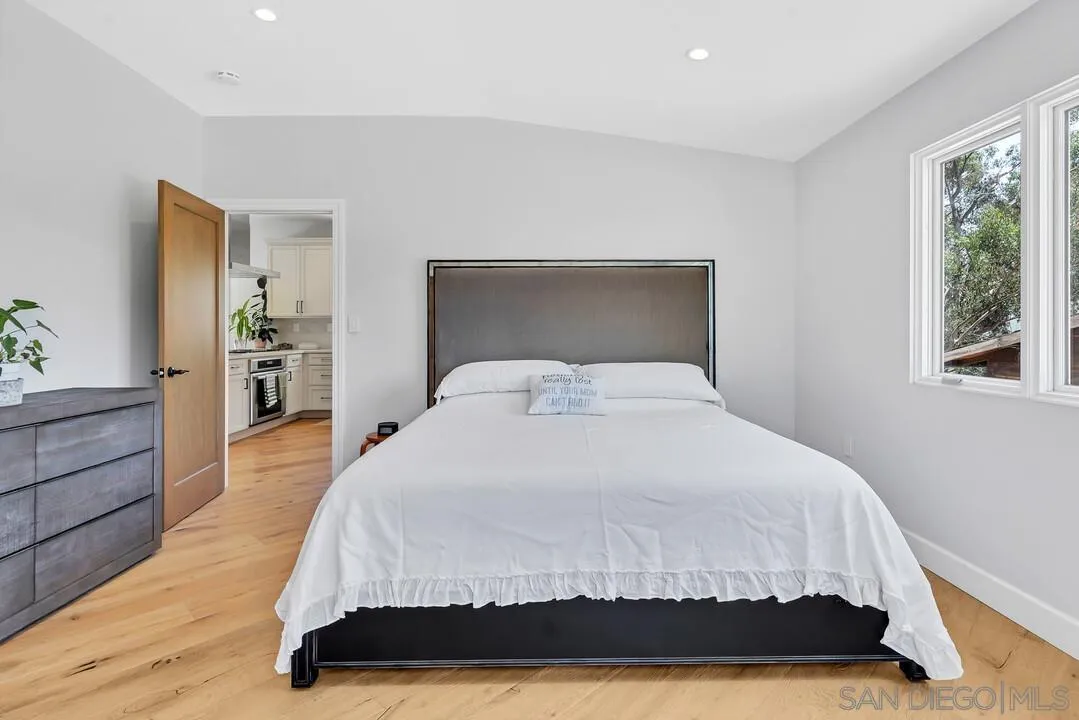 1356 Real Way Lane Alpine, CA 91901 - Photo 20 of 58 a large white bed in a white room