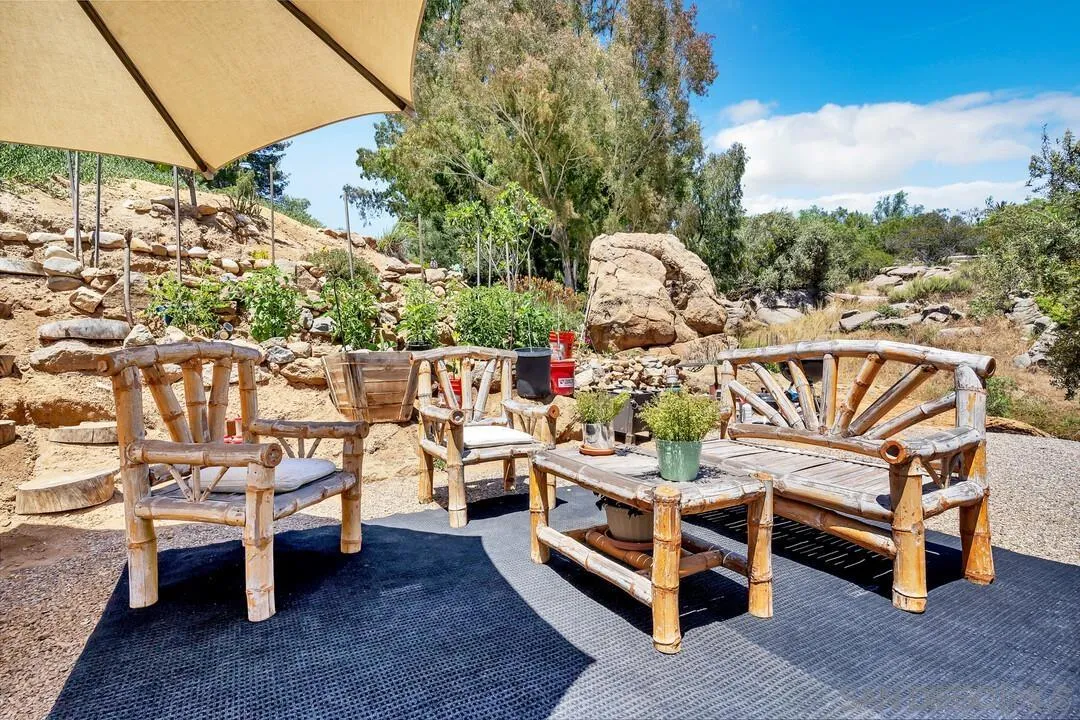 1356 Real Way Lane Alpine, CA 91901 - Photo 31 of 58 a view of a chairs and table in the backyard