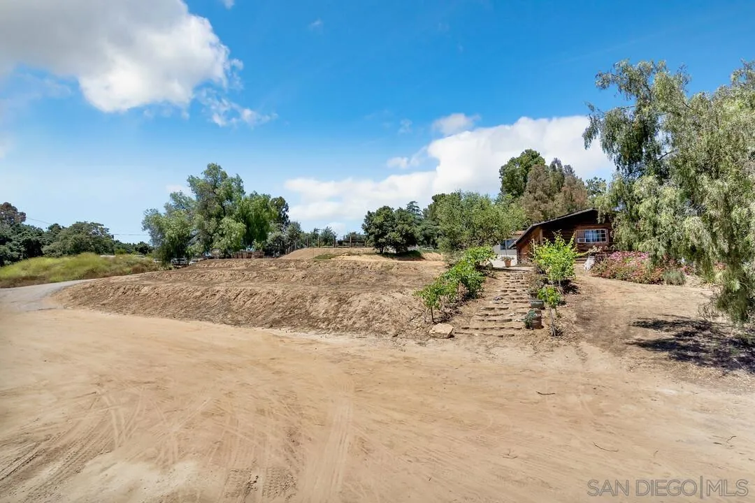 1356 Real Way Lane Alpine, CA 91901 - Photo 38 of 58 a view of a road with a building in the background