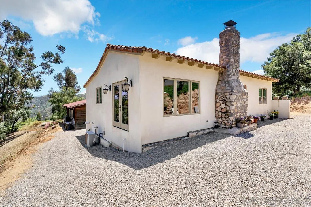 1356 Real Way Lane Alpine, CA 91901 - Photo 4 of 58 a view of a house with a yard and potted plants