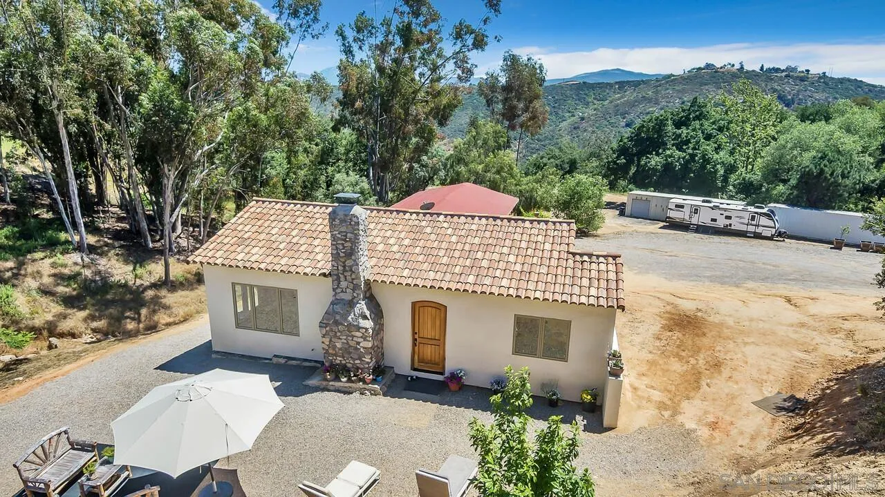1356 Real Way Lane Alpine, CA 91901 - Photo 56 of 58 a front view of a house with yard