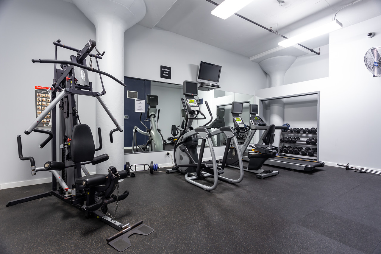 1224 West Van Buren Street, Unit 822 Chicago, IL 60607 - Photo 19 of 21 a view of a room with gym equipment