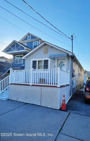 a view of a house with a deck