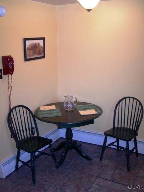 496 Covered Bridge Road, Unit 1 Quakertown, PA 18951 - Photo 4 of 11 a view of a workspace with furniture