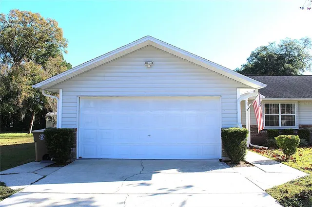 a front view of a house with barbeque