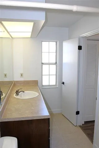 a view of staircase with white door