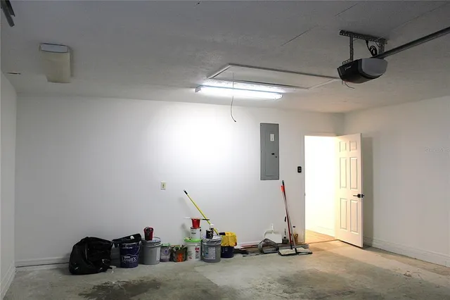 a view of a glass door with a tree in front