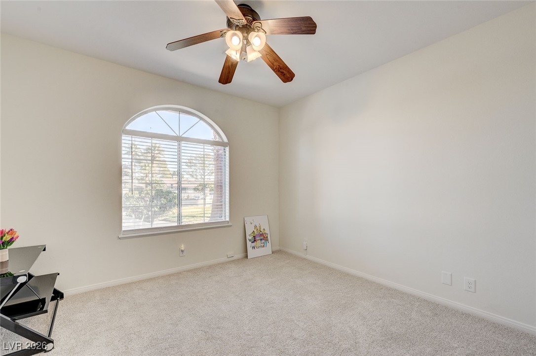 2955 El Camino Road Las Vegas, NV 89146 - Photo 42 of 99 Bedroom featuring light carpet and ceiling fan