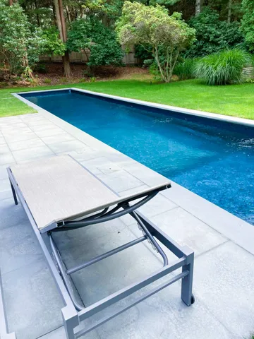 a view of an outdoor space and tennis court