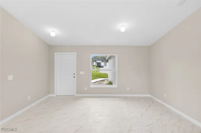 an empty room with window