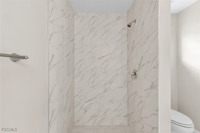 a bathroom with a shower curtain