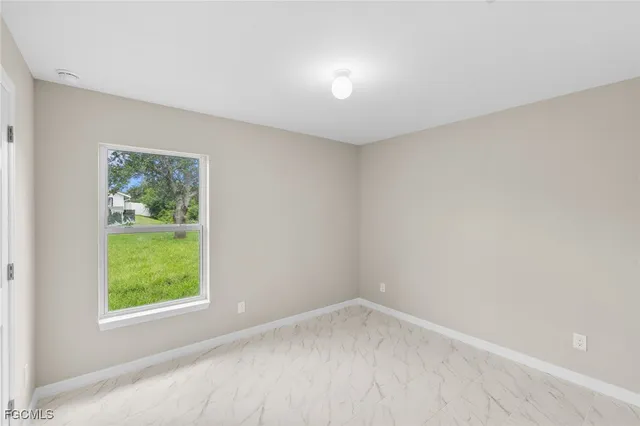 an empty room with a window