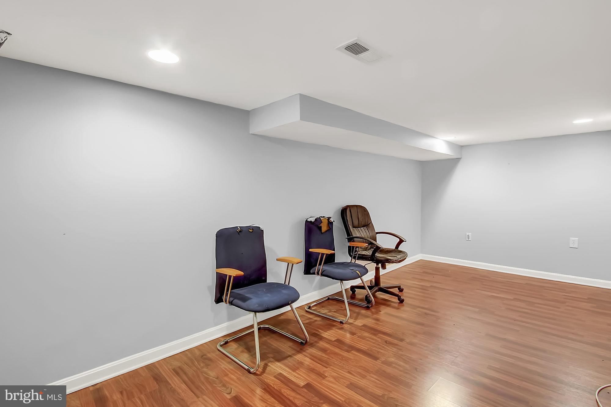 6756 Woodley Road Baltimore, MD 21222 - Photo 26 of 31 Large Basement Rec Room