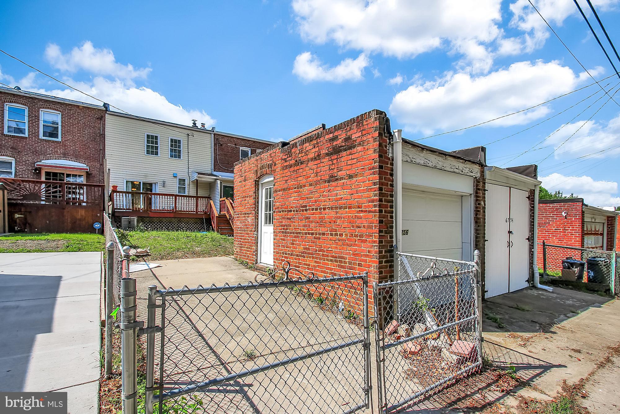 6756 Woodley Road Baltimore, MD 21222 - Photo 29 of 31 Detached garage and driveway