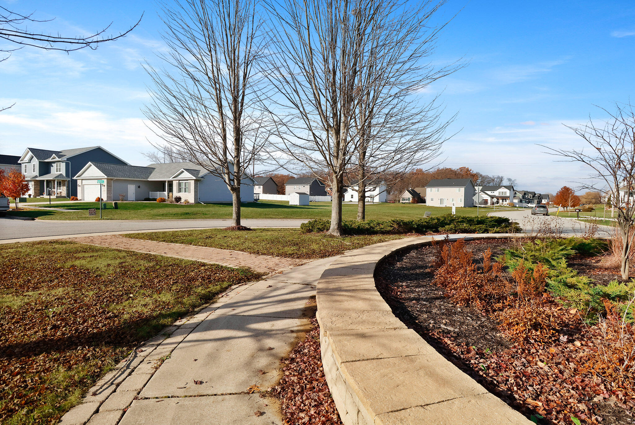 283 Apple Grove Lane Valparaiso, IN 46385 - Photo 4 of 8 a view of a city with large trees