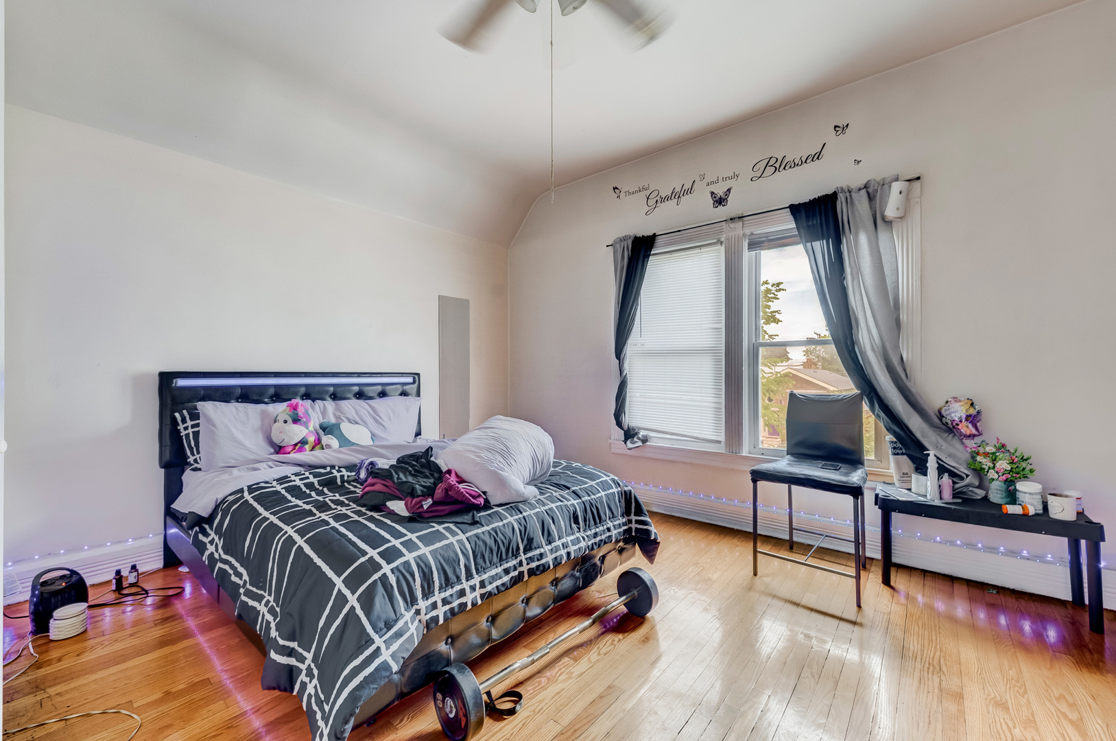 2530 North Neva Avenue Chicago, IL 60707 - Photo 11 of 50 a bedroom with a bed and a window