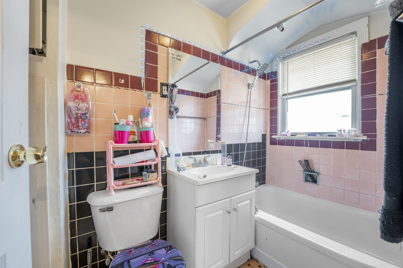 2530 North Neva Avenue Chicago, IL 60707 - Photo 12 of 50 a bathroom with a sink toilet vanity and tub