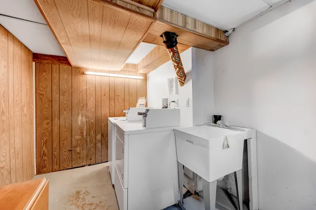 a view of a street with a building in the background