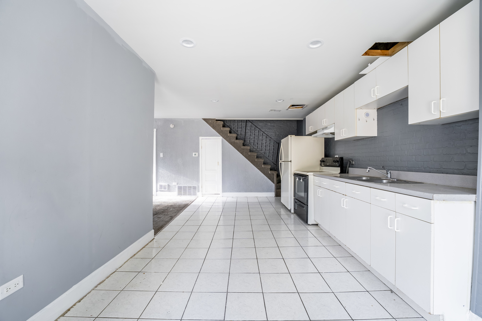2530 North Neva Avenue Chicago, IL 60707 - Photo 36 of 50 a view of a kitchen with an entryway