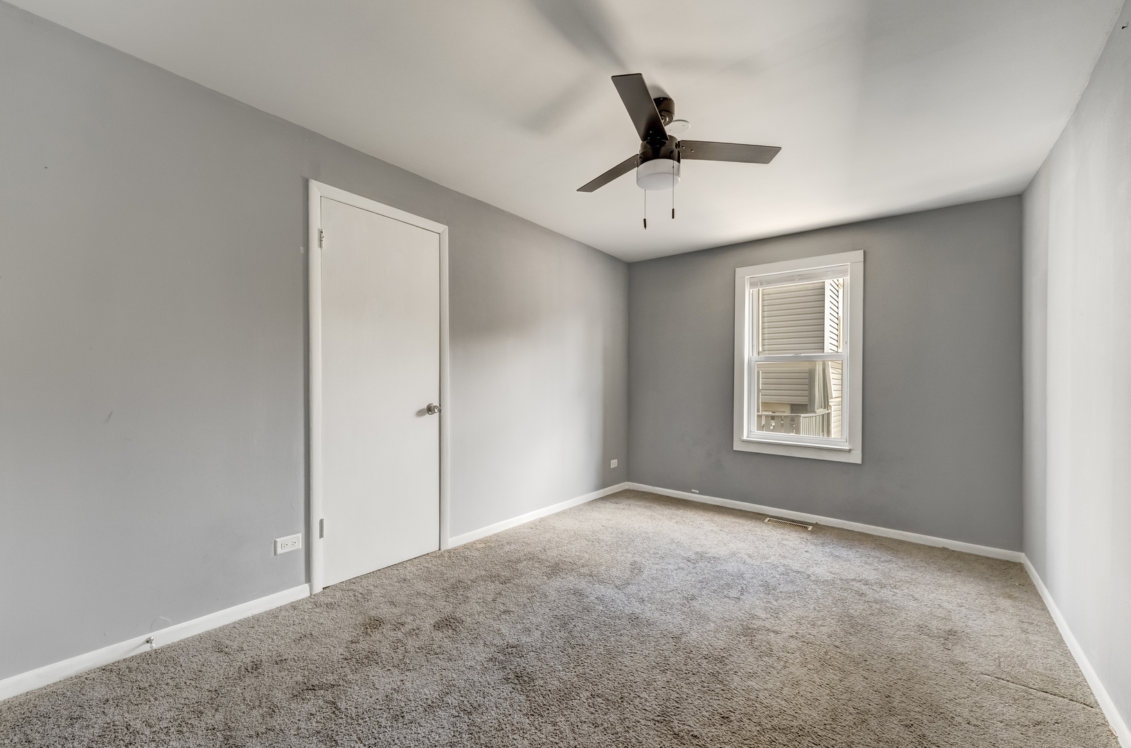 2530 North Neva Avenue Chicago, IL 60707 - Photo 42 of 50 a view of an empty room with a window