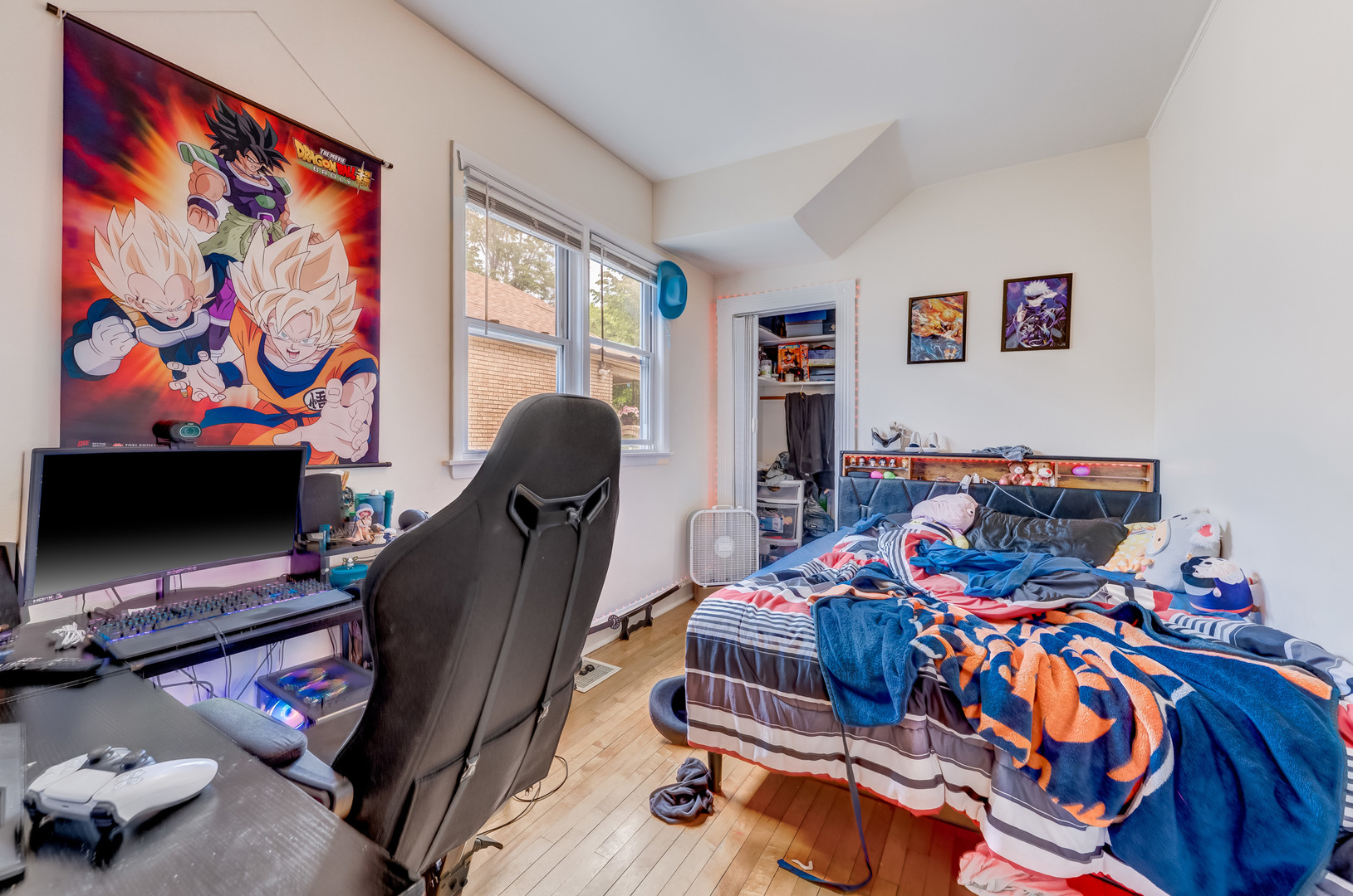 2530 North Neva Avenue Chicago, IL 60707 - Photo 9 of 50 a bedroom with furniture and a flat screen tv