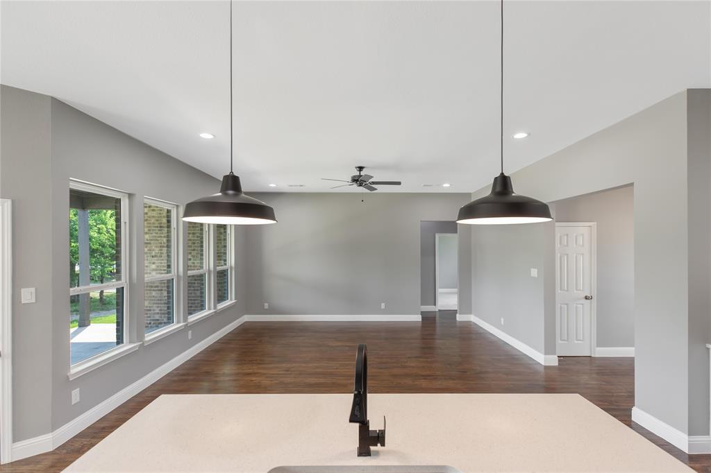 10560 Lago Vista Quinlan, TX 75474 - Photo 12 of 31 a view of a kitchen with a sink and window