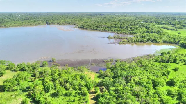 a view of a lake from a yard