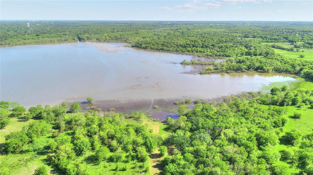 10560 Lago Vista Quinlan, TX 75474 - Photo 28 of 31 a view of a lake from a yard