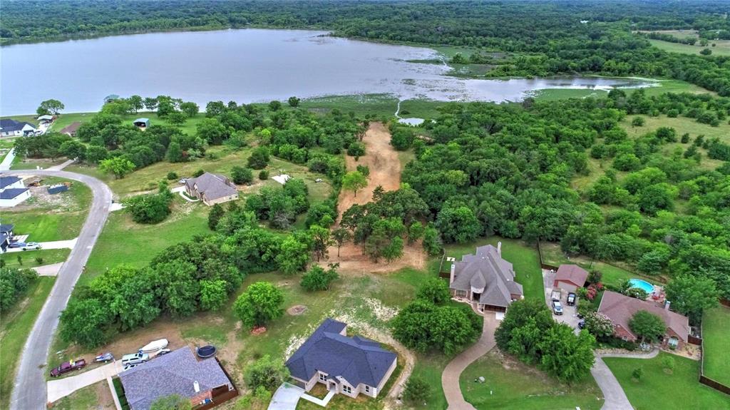 10560 Lago Vista Quinlan, TX 75474 - Photo 3 of 31 an aerial view of residential house with outdoor space and trees all around