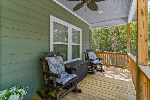 a roof deck with outdoor seating