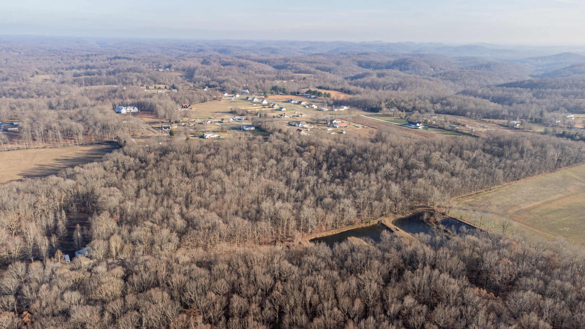 0 Mt Vernon Road Bethpage, TN 37022 - Photo 6 of 11 an aerial view of house with yard and mountain view in back