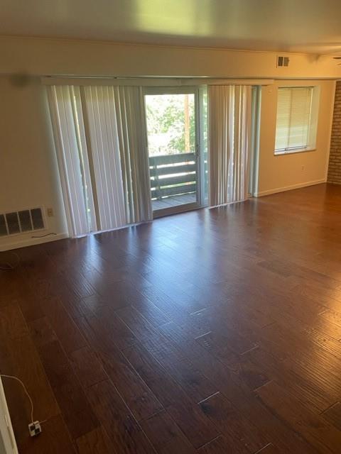 1009 Sanlin Drive Coraopolis, PA 15108 - Photo 2 of 10 an empty room with wooden floor and windows
