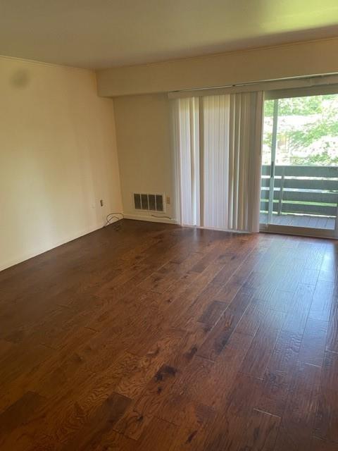 1009 Sanlin Drive Coraopolis, PA 15108 - Photo 3 of 10 an empty room with wooden floor and windows