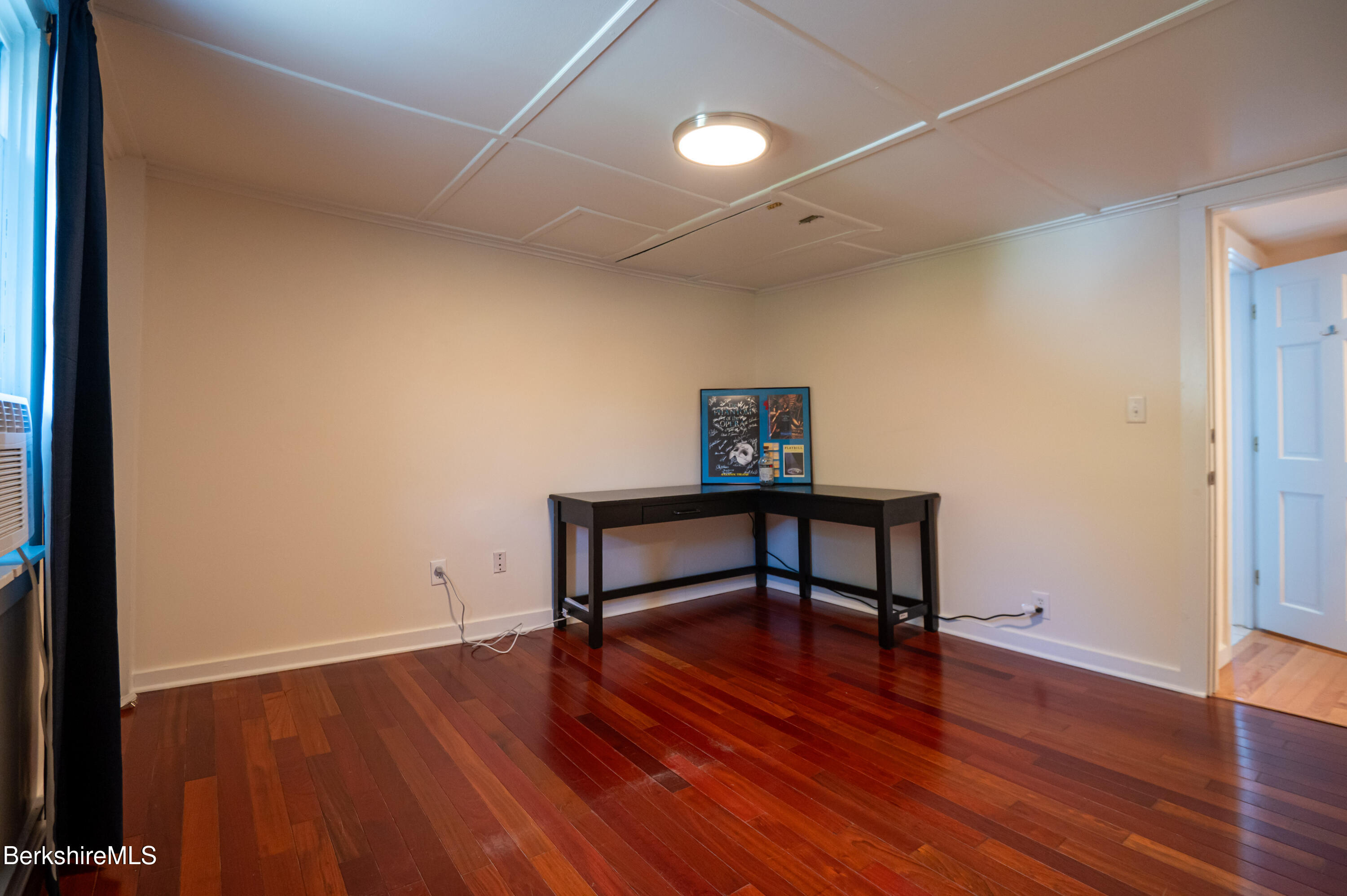 1600 Pleasant Street Lee, MA 01260 - Photo 24 of 26 a view of an empty room with wooden floor