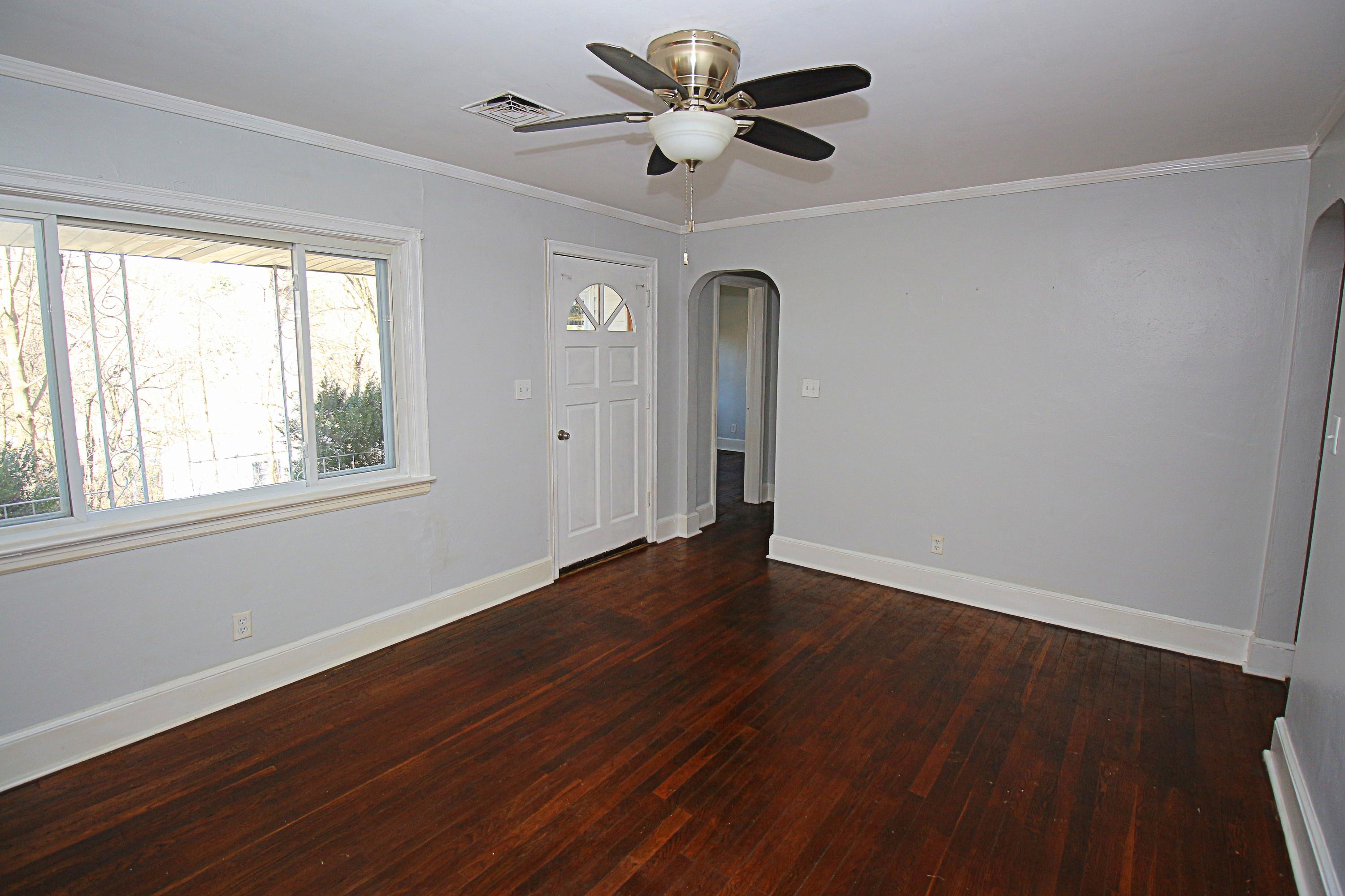 71 Rabbits Way Blue Ridge, VA 24064 - Photo 2 of 23 a view of a room with wooden floor and a ceiling fan