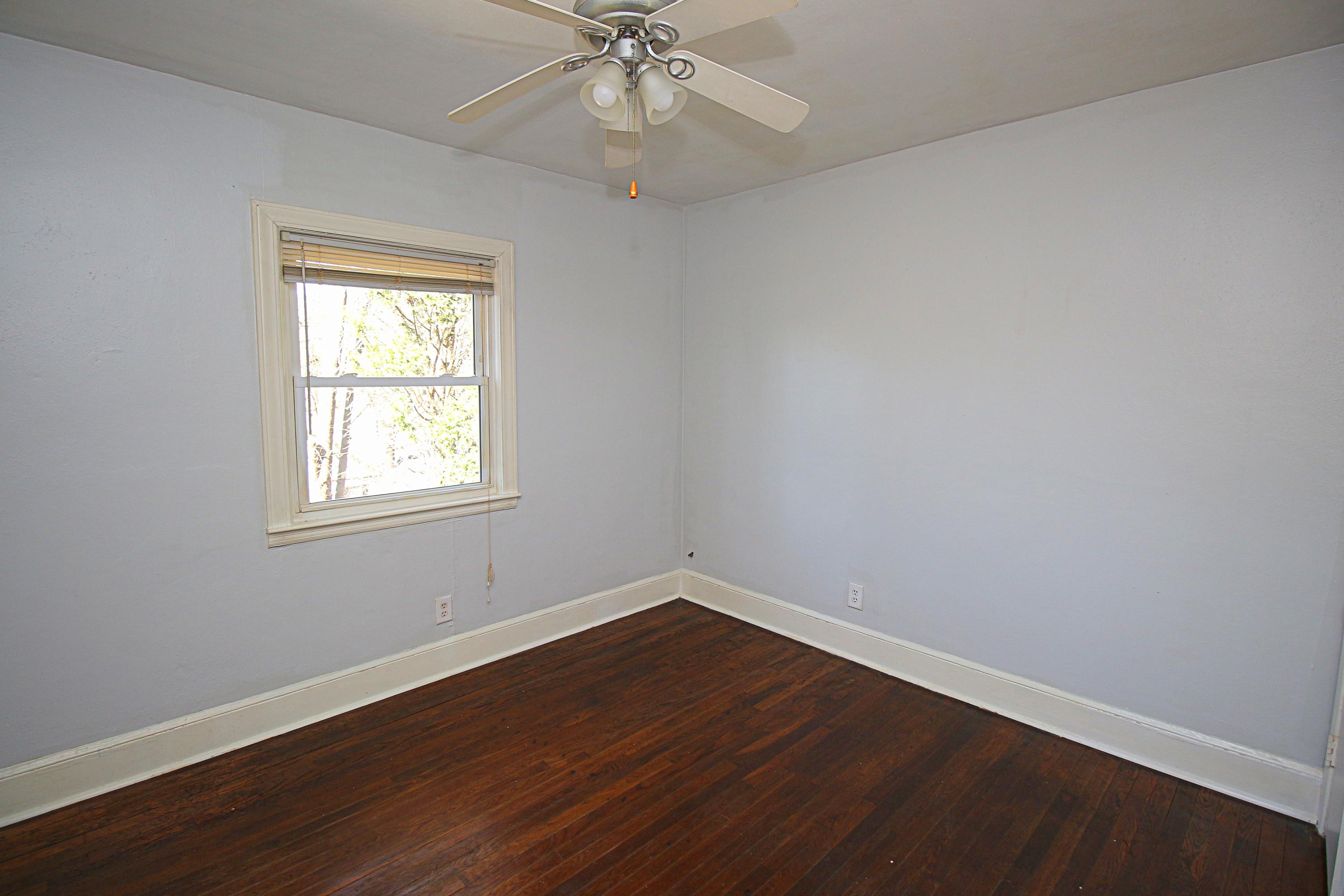 71 Rabbits Way Blue Ridge, VA 24064 - Photo 11 of 23 a view of an empty room with wooden floor and a window