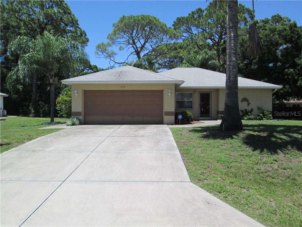 172 Stanford Road Venice, FL 34293 - Photo 1 of 1 Front view of home, nicely wooded area.