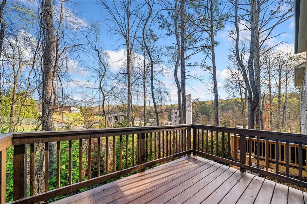 217 Whitetail Circle Canton, GA 30115 - Photo 19 of 30 a view of balcony with wooden floor
